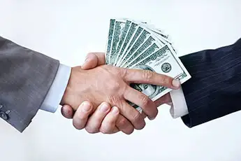 Cash offer and business handshake
